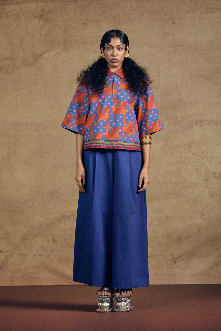 Kamdhenu Aplique Top And Blue Flarred Pant Set
