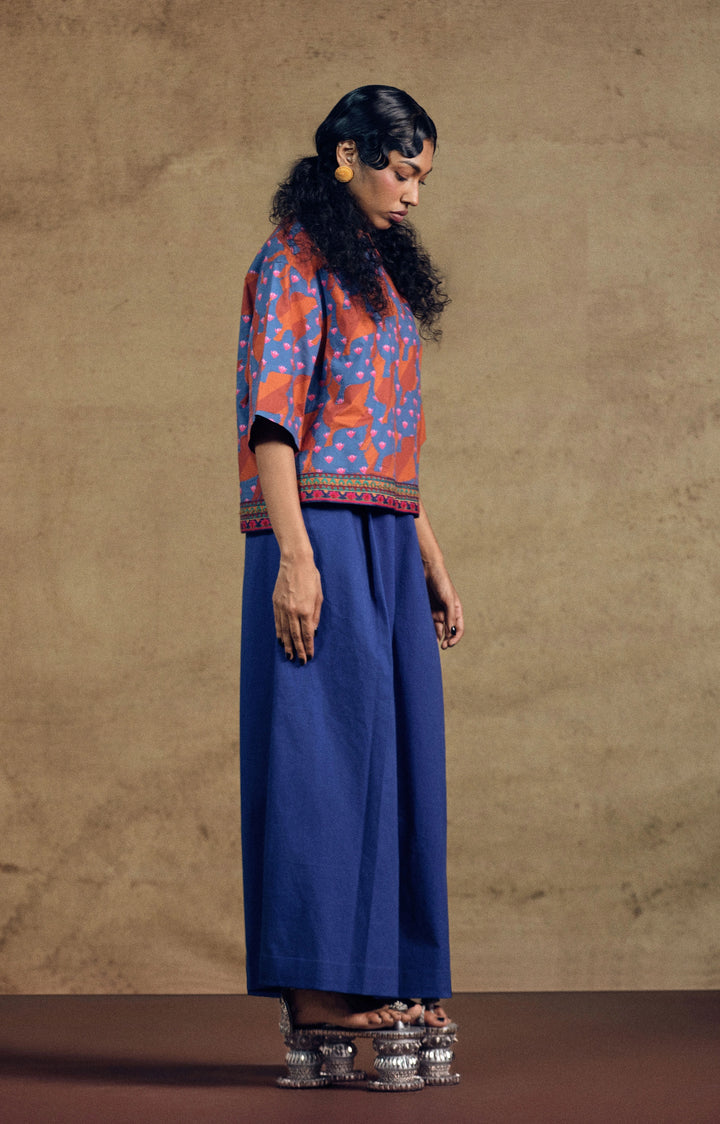 Kamdhenu Aplique Top And Blue Flarred Pant Set