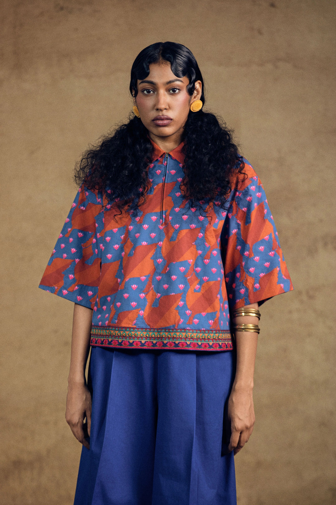Kamdhenu Aplique Top And Blue Flarred Pant Set