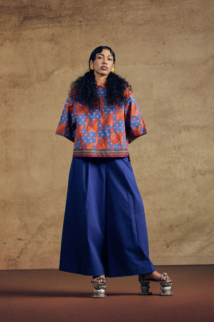 Kamdhenu Aplique Top And Blue Flarred Pant Set